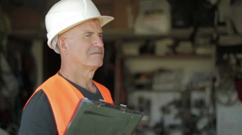 Worker or warehouseman looking at camera Video stock 32361406