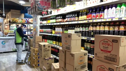 Worker Organizing Products And Boxes Korean Supermarket Stock Footage 130221840