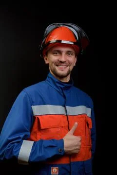 The worker in overalls Stock Photos