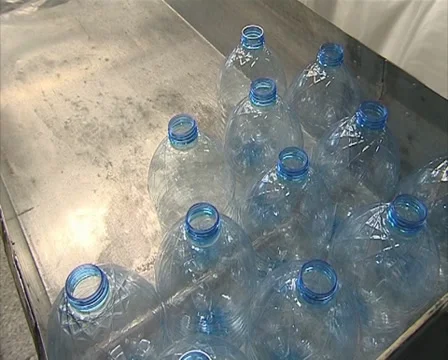 Worker pack large PET bottles. Plastic recycling. Stock Footage