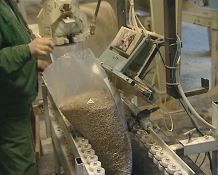 Worker pack pellets Stock Footage 10742744