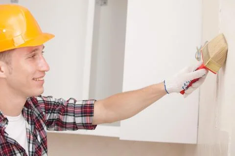 Worker with paint brush Stock Photos