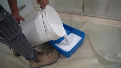 A worker painting a surface with precision Stock Footage 294067081