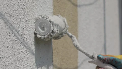 Worker paints the wall. White paint. Stock Footage 162655056