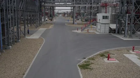 Worker pass through industrial facility Stock Footage 50444212