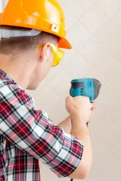 Worker with perforator Stock Photos