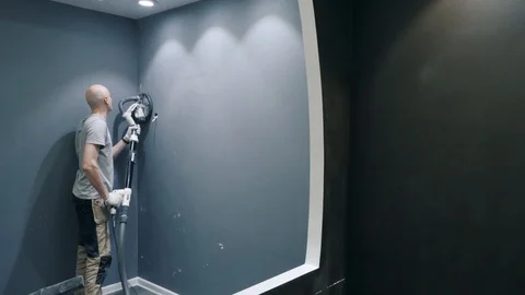 Worker performs flat repairing using grinding machine Stock Footage 124892457