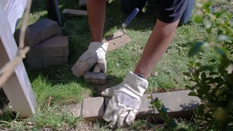 Worker placing a curb Stock Footage 151699648