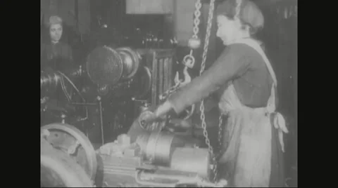 Worker placing iron in lathe machine Stock Footage 43312124