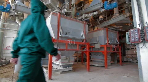 Worker in Plant for the production of feed Stock-Footage 63611908