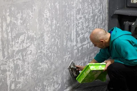 Worker Plastering Wall Stock Photos