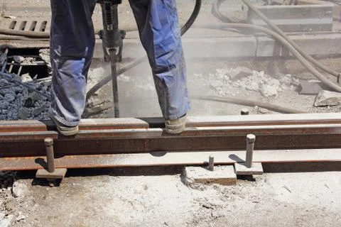 Worker with pneumatic hamme Stock Photos