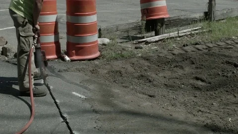 Worker With Pneumatic Hammer Drill Drilling Into Asphalt At Construction Site Stock Footage 76767769