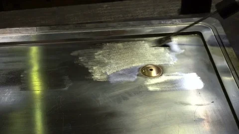 Worker polishes a metal surface Stock Footage 76901319