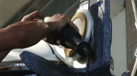 Worker polishing boat Stock Footage 36920072