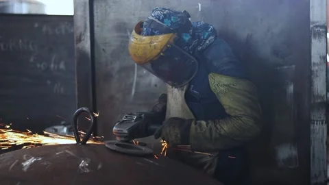 Worker polishing a boiler cover medium plane Stock Footage 201262682