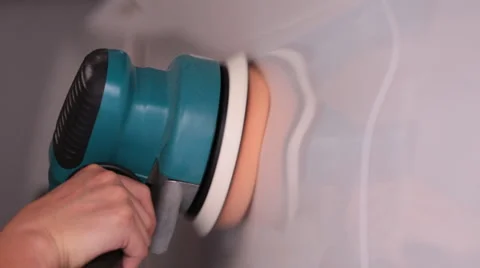 Worker Polishing the car with power buffer machine . Stock Footage 49191056