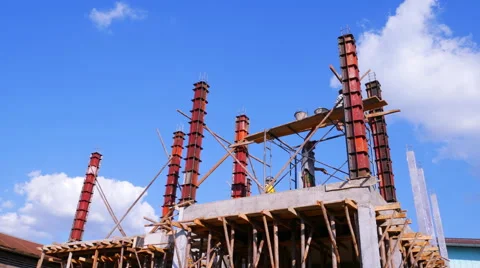 Worker pouring cement for build construction pillar Stock Footage 58829754