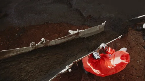 Worker pouring concrete at the construction site. Concrete unloading - close up Stock Footage 170721069