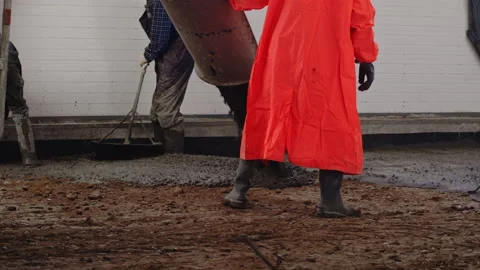 Worker pouring concrete at the construction site. Concrete screed pouring Stock Footage 170721136