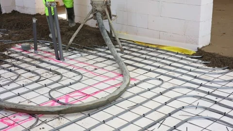 Worker Pouring Concrete Floor in New Building Stock Footage 314426403