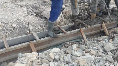 Worker pouring concrete Stock Footage 282970148