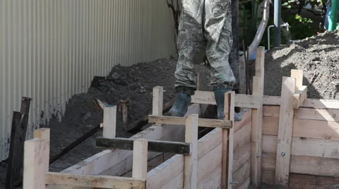 Worker pours the foundation of building 스톡 동영상 6601736