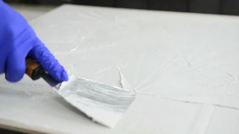 Worker practicing in applying cement coating Stock Footage 131861694