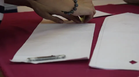 Worker prepares pattern for cutting fabric 6 스톡 동영상 33312352