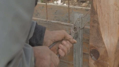 Worker preparing armature with a wire Stock Footage 73465145