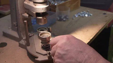 Worker preparing buttons in a plant Stock Footage 46935460