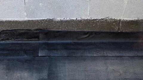 Worker preparing part of bitumen roofing felt roll 스톡 동영상 98300966