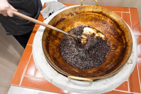 Worker preparing tapioca pearl balls into bubble or boba tea Stock Photos