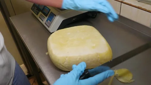 Worker Preparing Traditional Bryndza Cheese in Dairy Facility Stock-Footage 343669632