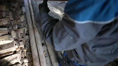 Worker preparing wood for cutting Stock Footage 158976998