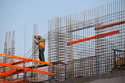 Worker prepearing concrete bars Stock Photos