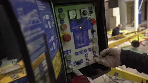 Worker press on buttons on a plant Stock Footage 171585559