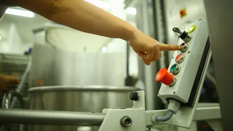 Worker presses a button on the equipment Video stock 105080632