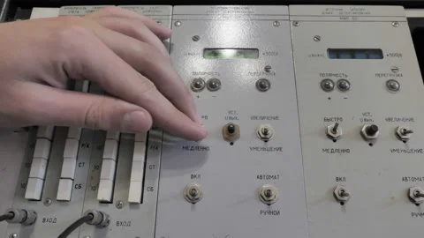 The Worker Presses The Buttons Of The Old Control Panel In Factory Stock Footage 201621477