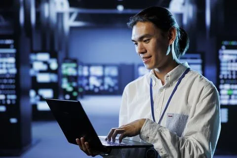 Worker prevents server system overload Stock Photos
