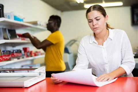 Worker in printing and press centar check print quality Stock Photos