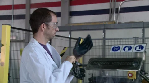 Worker in printing house Stock Footage 33820720