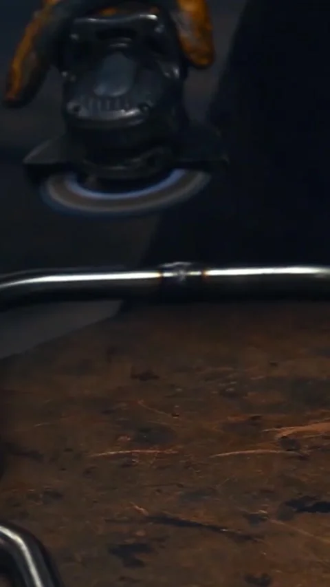 Worker processing metal with a spiral saw Stock-Footage 334877367