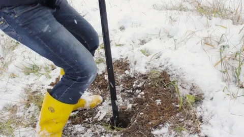 Worker produces drilling to test soil before installing the base. Construction. Video stock 72375147