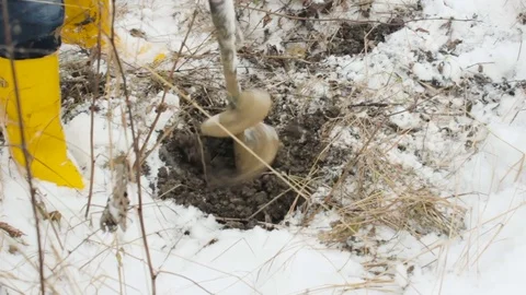 Worker produces drilling to test soil before installing the base. Construction. Video stock 72375908