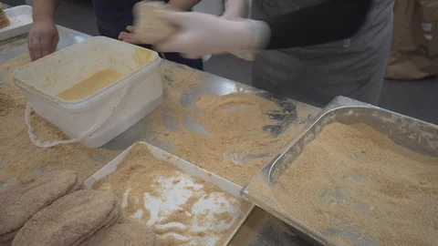 Worker produces schnitzels  in meat processing factory Stock Footage 124320083