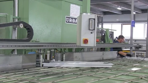 Worker in the production of plastic windows Stock Footage 103373068