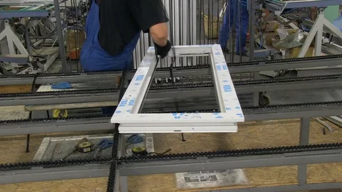 Worker, the production of plastic windows Stock Footage 103373139