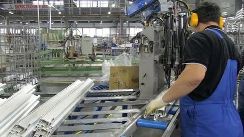 Worker on the production of plastic windows Stock Footage 103373170