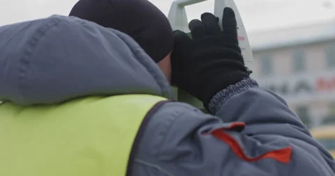 Worker Professional Surveying Engineer in the open space. A professional Video stock 145343440